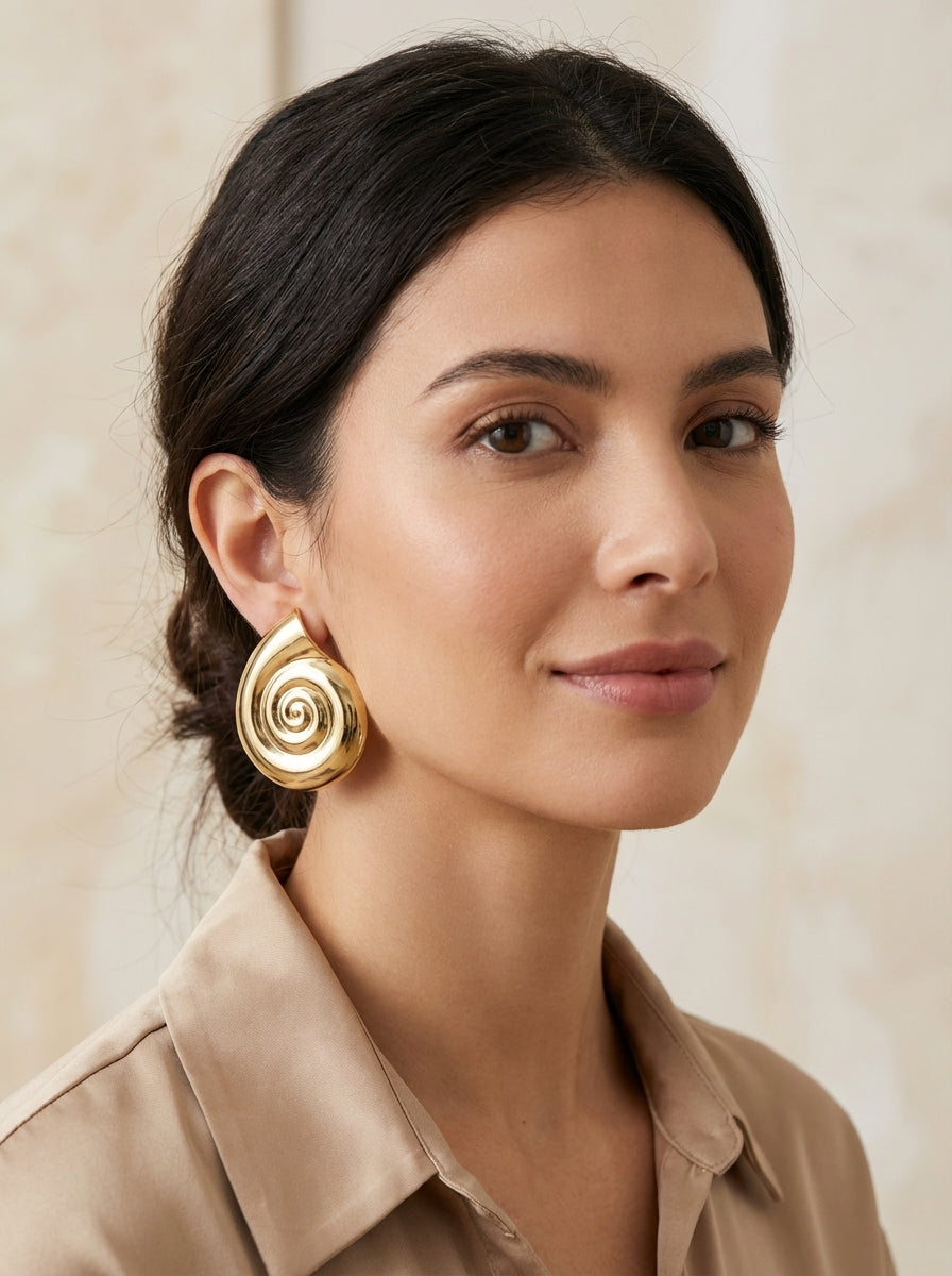Aretes Espiral Dorados Elegantes ✨