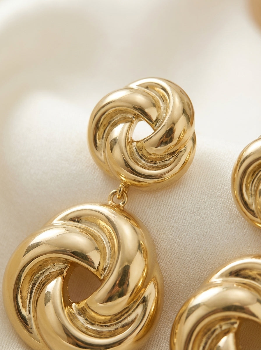 Maxi aretes Nudo Dorados Elegantes ✨